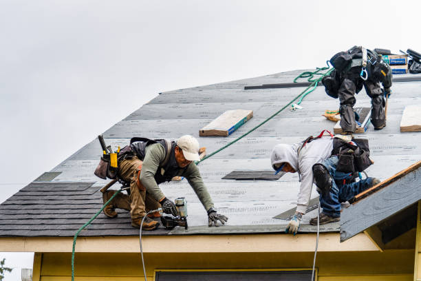 Professional Roofing technician working in Moss Beach, CA